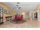 Spacious dining room featuring tile floors, ceiling fan, and adjacent living spaces at 258 Venezia Ct, Punta Gorda, FL 33950