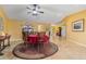 Well-lit dining room showcasing decor, tile flooring, and a table for six at 258 Venezia Ct, Punta Gorda, FL 33950