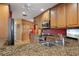 Well-equipped kitchen featuring granite countertops, stainless steel appliances, and ample cabinet space at 258 Venezia Ct, Punta Gorda, FL 33950