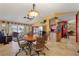 Open-concept living room with views of the waterfront, a dining area and a vibrant color scheme at 258 Venezia Ct, Punta Gorda, FL 33950