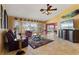 Bright living room featuring waterfront views, comfortable seating, and stylish decor at 258 Venezia Ct, Punta Gorda, FL 33950