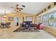 Open living area with vaulted ceilings, tile floors, a dining area and water views at 258 Venezia Ct, Punta Gorda, FL 33950