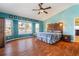 Large main bedroom with waterfront views, and carved wood headboard at 258 Venezia Ct, Punta Gorda, FL 33950