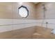 Close up shot of the tile in the walk-in shower at 258 Venezia Ct, Punta Gorda, FL 33950