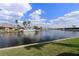 Picturesque waterfront view with boat docks and lush landscaping at 258 Venezia Ct, Punta Gorda, FL 33950