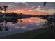 Beautiful sunset view over the water, showcasing the serene waterfront lifestyle at 258 Venezia Ct, Punta Gorda, FL 33950