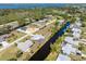 Stunning aerial view of a waterfront community with canals and lush greenery at 3024 Caribbean Dr, Punta Gorda, FL 33950
