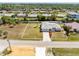 Aerial perspective of the property, highlighting the manicured landscaping and waterfront location at 3024 Caribbean Dr, Punta Gorda, FL 33950