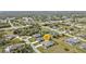 Neighborhood aerial view highlighting a single Gathering home with a pool at 321 Pessoa St, Punta Gorda, FL 33983