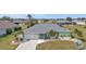 Charming single-story home with attached garage and well-manicured landscaping at 321 Pessoa St, Punta Gorda, FL 33983
