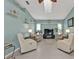 Bright living room with a high ceiling, skylight, ceiling fan, and neutral wall paint at 321 Pessoa St, Punta Gorda, FL 33983