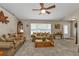 Cozy living room features vaulted ceiling, comfortable seating, natural light and stylish accents at 321 Pessoa St, Punta Gorda, FL 33983