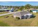 Aerial view of a home with an enclosed back porch and mature landscaping at 346 Cypress Nw Ave, Port Charlotte, FL 33952