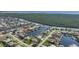 Scenic aerial shot of a residential community with canals and waterfront properties, highlighting the area's boating lifestyle at 3906 Crooked Island Dr, Punta Gorda, FL 33950