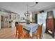 Dining area with seating for eight and a view to the kitchen at 3906 Crooked Island Dr, Punta Gorda, FL 33950