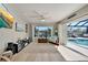 Living area with a view of the pool and waterfront at 3906 Crooked Island Dr, Punta Gorda, FL 33950