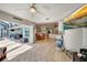 Open-concept living area flows into the dining area and kitchen, with access to the lanai at 3906 Crooked Island Dr, Punta Gorda, FL 33950