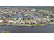 Stunning aerial view of waterfront homes with private docks on a beautiful canal community at 3961 San Pietro Ct, Punta Gorda, FL 33950