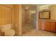 Bathroom featuring tiled shower with seat, granite counters and vanity with ample storage at 3961 San Pietro Ct, Punta Gorda, FL 33950