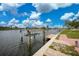 Dock and boat lift with canal view at 3961 San Pietro Ct, Punta Gorda, FL 33950