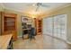 Bright home office with tile flooring and sliding glass door at 3961 San Pietro Ct, Punta Gorda, FL 33950