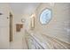 Bathroom with long vanity and stained glass window at 413 Valletta Ct, Punta Gorda, FL 33950