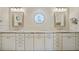 Bathroom with double vanity, granite countertop, and octagon stained glass window at 413 Valletta Ct, Punta Gorda, FL 33950
