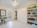 Guest bedroom featuring a built-in murphy bed and built-in shelving at 413 Valletta Ct, Punta Gorda, FL 33950