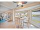 Sunny breakfast nook features a view overlooking the canal and outdoor patio at 413 Valletta Ct, Punta Gorda, FL 33950