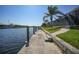 Dock and canal featuring access to waterways and beautiful waterfront community at 413 Valletta Ct, Punta Gorda, FL 33950
