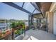 Screened lanai featuring a view of the canal and a boat lift at 413 Valletta Ct, Punta Gorda, FL 33950