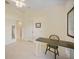Office space with light-colored walls, a dark desk, and neutral flooring at 413 Valletta Ct, Punta Gorda, FL 33950