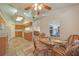 Open concept kitchen and dining area with wood cabinets and a skylight at 468 Paramaribo St, Punta Gorda, FL 33983