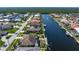 Waterfront estate features private dockage, beautiful landscaping, and tranquil coastal living at 5032 La Costa Island Ct, Punta Gorda, FL 33950
