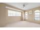 Neutral bedroom featuring multiple windows that allow for ample natural light at 5032 La Costa Island Ct, Punta Gorda, FL 33950