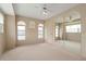 Neutral bedroom featuring multiple windows that allow for ample natural light at 5032 La Costa Island Ct, Punta Gorda, FL 33950