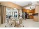 Eat in kitchen with stainless steel appliances, island, and granite countertops at 5032 La Costa Island Ct, Punta Gorda, FL 33950