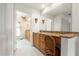 Main bathroom includes large dressing table/vanity at 5032 La Costa Island Ct, Punta Gorda, FL 33950