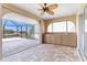 Screened in patio features an outdoor kitchen area, with countertop, sink, and pool views at 5032 La Costa Island Ct, Punta Gorda, FL 33950