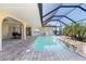 Beautiful screened pool with direct access to the house, ideal for relaxing and swimming at 5032 La Costa Island Ct, Punta Gorda, FL 33950