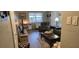 Comfortable living room with recliner, coffee table, and media center at 5100 Bullard St, North Port, FL 34287