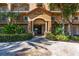 Beautiful entrance to building with detailed landscaping at 93 Vivante Blvd # 9323, Punta Gorda, FL 33950