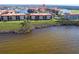 Waterfront condos with mature trees and lush green space near a lake at 93 Vivante Blvd # 9323, Punta Gorda, FL 33950