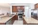 Spacious kitchen with stainless appliances, granite countertops and cabinets with lots of storage at 93 Vivante Blvd # 9323, Punta Gorda, FL 33950