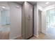 Hallway features hardwood floors, and closet space at 11401 2Nd Ave, Punta Gorda, FL 33955