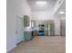 Modern kitchen boasts stainless steel appliances, gray cabinets, and sleek countertops at 11401 2Nd Ave, Punta Gorda, FL 33955