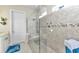 Bathroom features large walk-in shower, double sinks, and seamless glass at 13056 N Marsh Dr, Port Charlotte, FL 33953