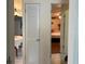 Hallway features a view into the bedroom and a pantry at 137 Revere Nw St, Port Charlotte, FL 33952