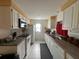 Functional kitchen with white cabinets, essential appliances, and ample counter space for meal preparation at 137 Revere Nw St, Port Charlotte, FL 33952
