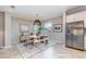 Bright dining room featuring a modern table set, stylish decor, and tile flooring at 14049 Black Beauty Dr # 721, Punta Gorda, FL 33955